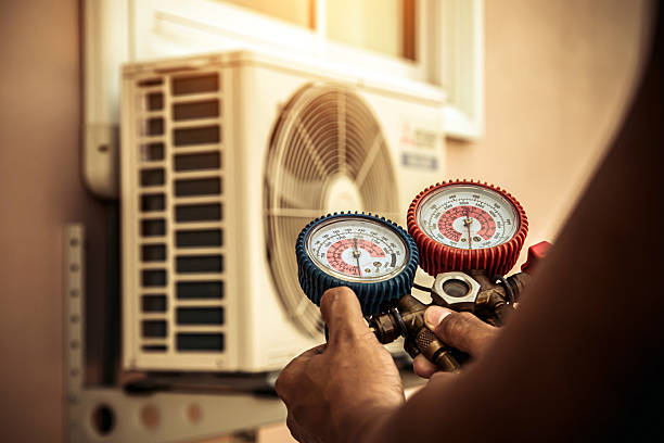 Professional Air Conditioning Service technician working in Harleigh, PA